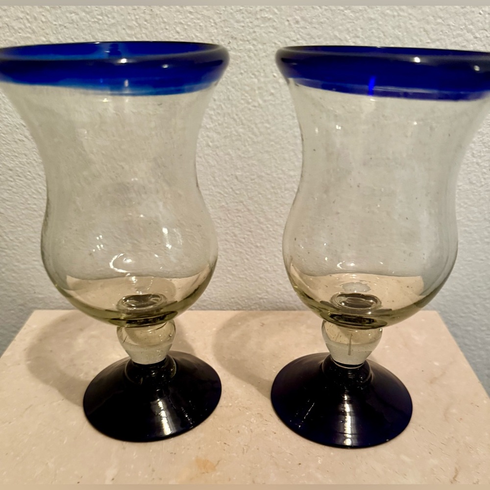 Handblown, recycled, blue glass goblets. Approximately 7”H